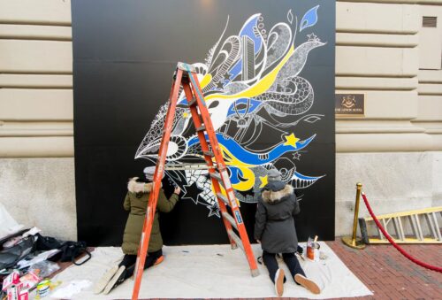 The Montague sisters working on the Marathon Mural