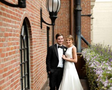 Bride and Groom Outside Their Wedding Venue